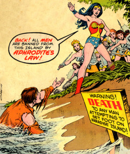 Clipping from a Wonder Woman comic, with Wonder Woman saying "Back! All men are banned from this island by Aprodite's Law!"